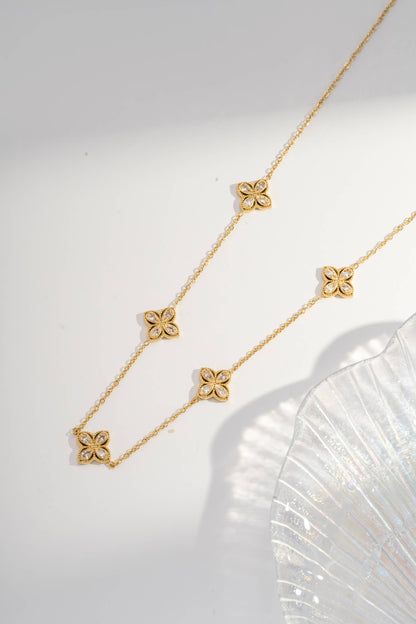 COSMOS Kleeblatt Schmuck-Set aus Stahl: Kette, Armband und Ohrringe in Gold